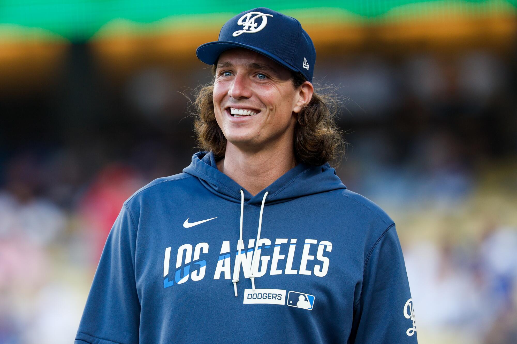 Dodgers pitcher Tyler Glasnow smiles on the field before the Dodgers' 9-2 win Saturday.