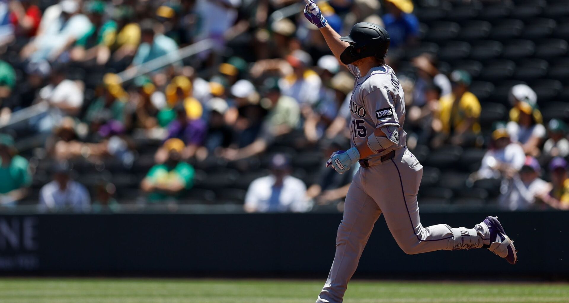 Rockies set club record for runs with 23-9 victory over A's in Las Vegas heat