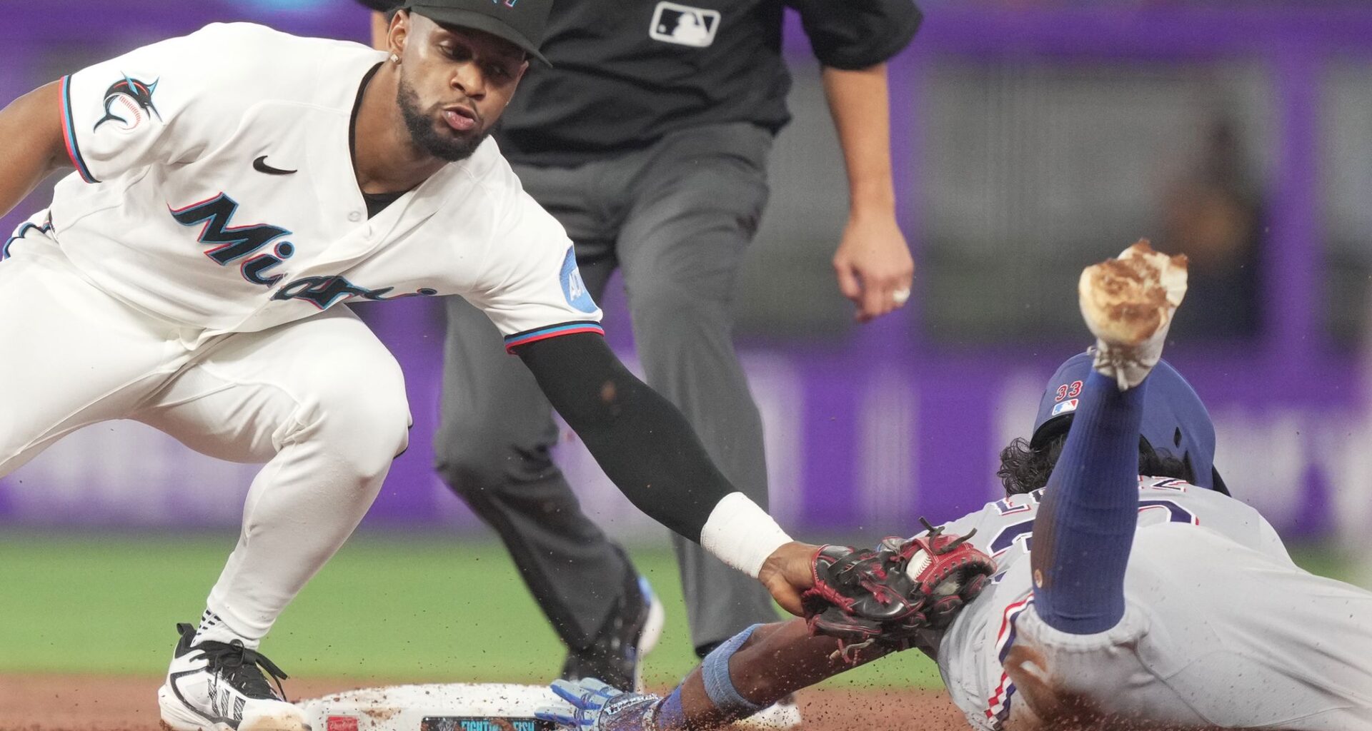 Otto López homers, has another multi-hit game and Marlins beat Rangers 4-2