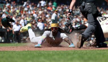Athletics score 4 times with 2 out in the 9th inning, rally to beat the Giants 9-6
