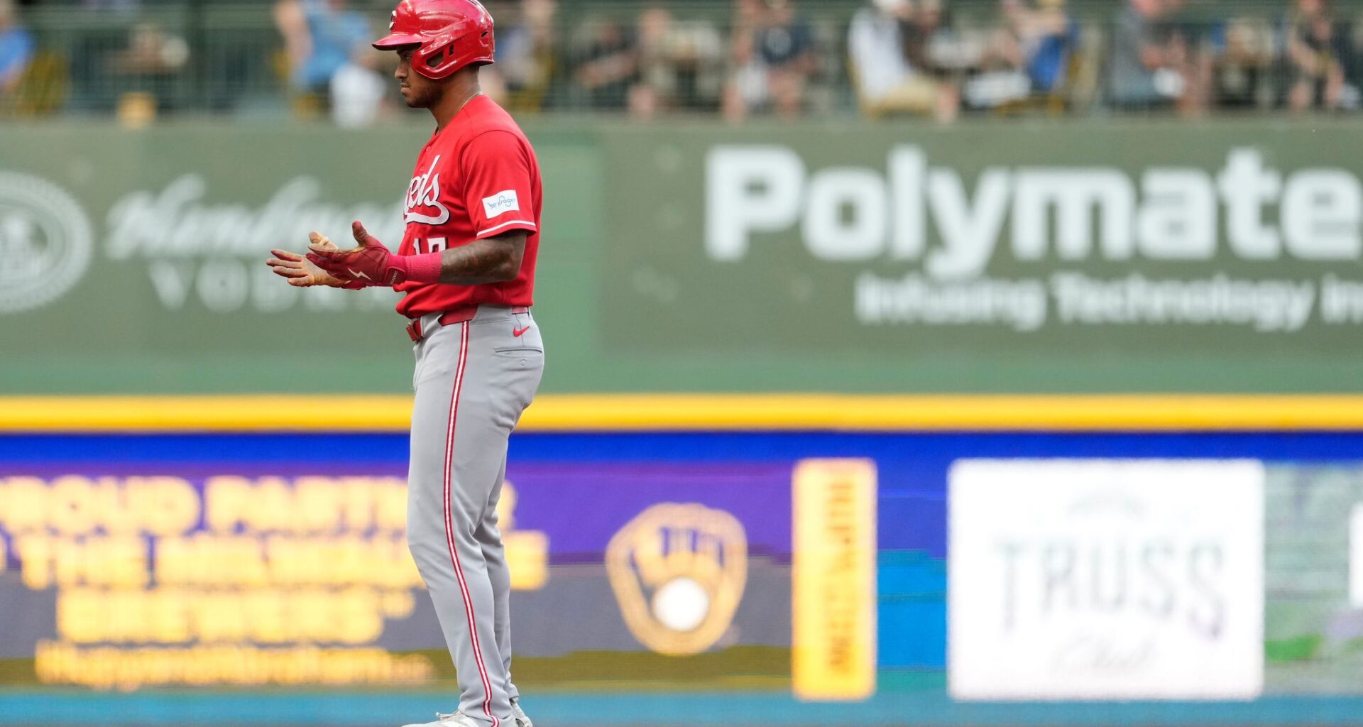 Reds Dane Myers carted from field after crashing into wall