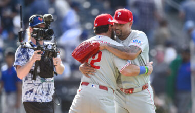 Jun 28, 2026; New York City, New York, USA; Philadelphia Phillies designated hitter Kyle Schwarber (12) and pitcher Jhoan Duran (59) embrace after winning against the New York Mets at Citi Field. Mandatory Credit: John Jones-Imagn Images