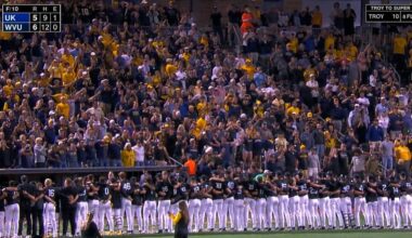 West Virginia sings 'Country Roads' with their home crowd after advancing to super regionals