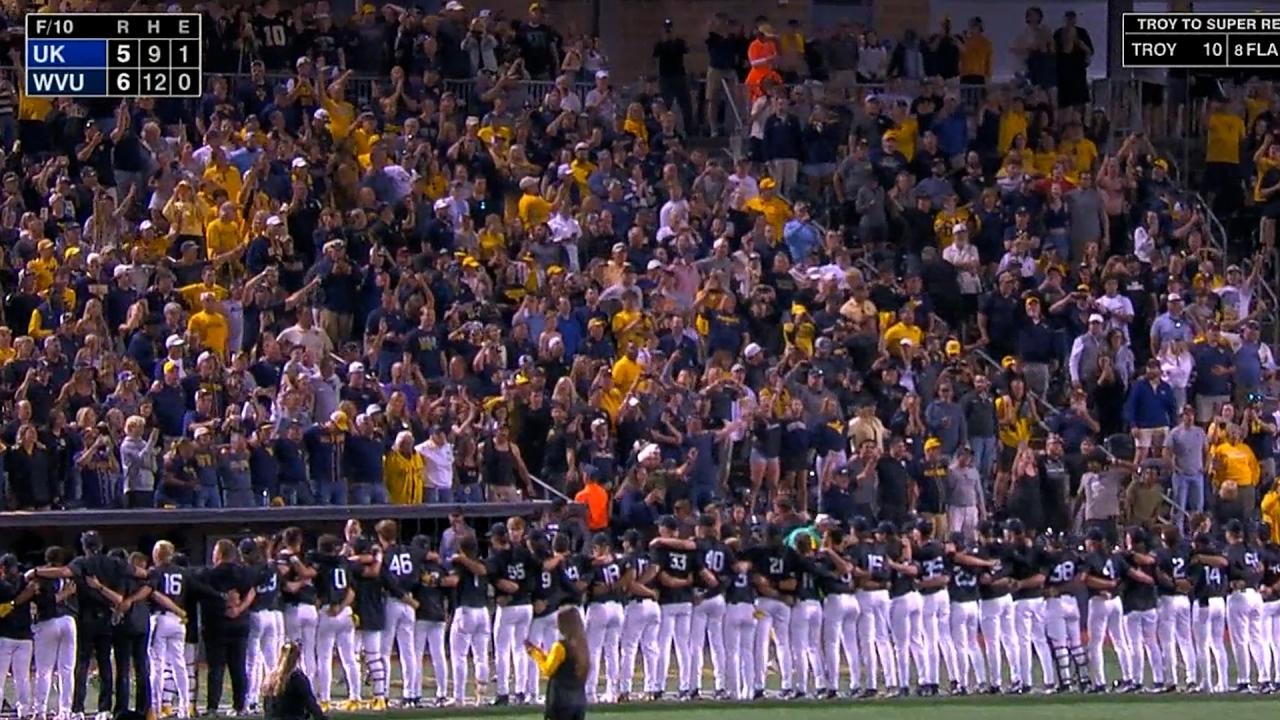 West Virginia sings 'Country Roads' with their home crowd after advancing to super regionals