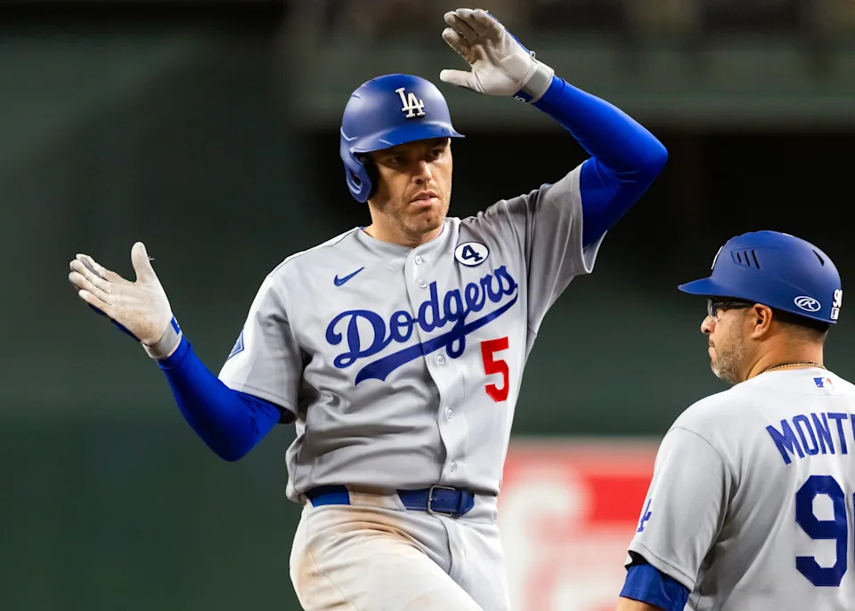 Los Angeles Dodgers first baseman Freddie Freeman reacts after hitting a seventh inning single against the Arizona Diamondbacks at Chase Field on June 2, 2026