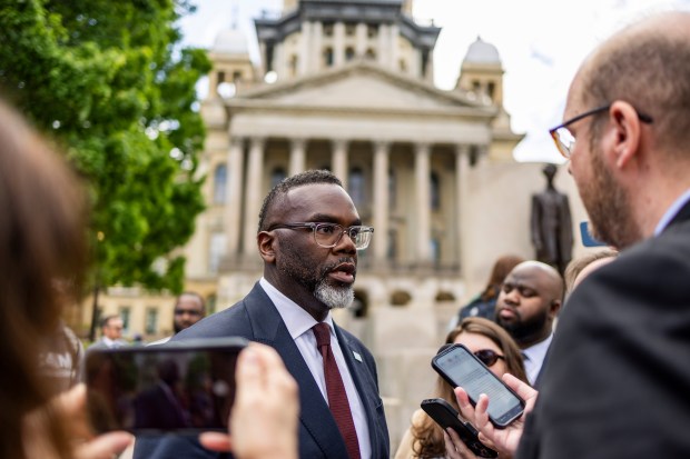 Mayor Brandon Johnson speaks to reporters outside the the Illinois State Capitol building on May 6, 2026. (Eileen T. Meslar/Chicago Tribune)