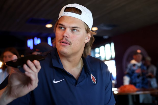 Illinois defensive lineman Joe Barna is interviewed before Illini Night at the Cubs-Athletics game Tuesday, June 2, 2026, at Wrigley Field. (Chris Sweda/Chicago Tribune)
