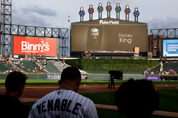 Former Chicago Bulls player and announcer Stacey King is honored with a moment of silence before a game between the Chicago White Sox and the Atlanta Braves at Rate Field in Chicago on June 9, 2026. (Chris Sweda/Chicago Tribune)