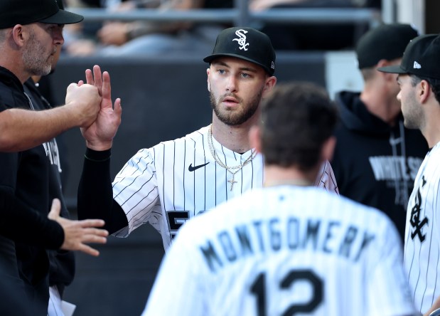Chicago White Sox starting pitcher Sean Burke is congratulated in the dugout after shutting down the Cleveland Guardians in the second inning of a game at Rate Field in Chicago on June 23, 2026. (Chris Sweda/Chicago Tribune)