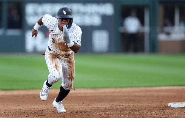 Chicago White Sox shortstop Luisangel Acuña (0) advances to third base after a throwing error following Acuña's stolen base in the fifth inning of a game against the Cleveland Guardians at Rate Field in Chicago on June 23, 2026. (Chris Sweda/Chicago Tribune)