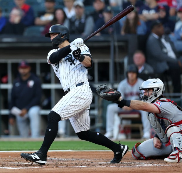 Chicago White Sox designated hitter Randal Grichuk (34) hits a double in the fourth inning of a game against the Cleveland Guardians at Rate Field in Chicago on June 23, 2026. (Chris Sweda/Chicago Tribune)