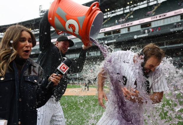 White Sox right fielder Tristan Peters gets a Gatorade bath from pitcher Erick Fedde after hitting a game-winning RBI single against the Blue Jays in the 10th inning April 3, 2026, at Rate Field. (John J. Kim/Chicago Tribune)