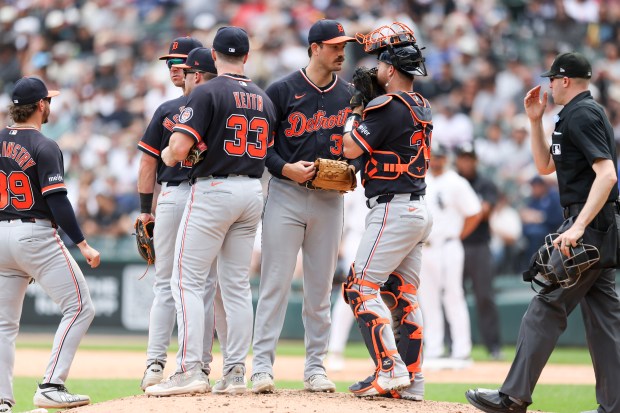 Detroit Tigers pitcher Drew Anderson (38) huddles up with teammates in the seventh inning against the Chicago White Sox at Rate Field on May 31, 2026. (Eileen T. Meslar/Chicago Tribune)