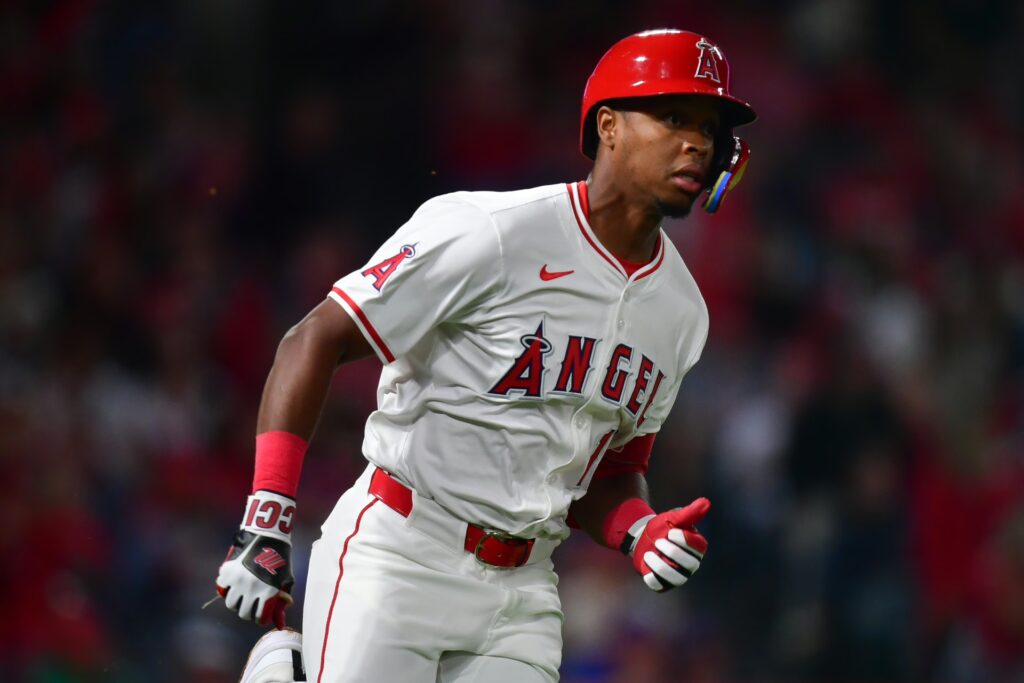 Sep 26, 2025; Anaheim, California, USA; Los Angeles Angels shortstop Denzer Guzman (13) runs after hitting an RBI double against the Houston Astros during the fifth inning at Angel Stadium. Mandatory Credit: Gary A. Vasquez-Imagn Images