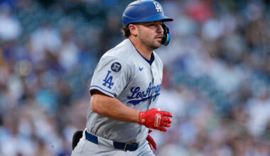 Aug 19, 2025; Denver, Colorado, USA; Los Angeles Dodgers third baseman Buddy Kennedy (46) runs to first on an RBI single advancing to second in the third inning against the Colorado Rockies at Coors Field. Mandatory Credit: Isaiah J. Downing-Imagn Images
