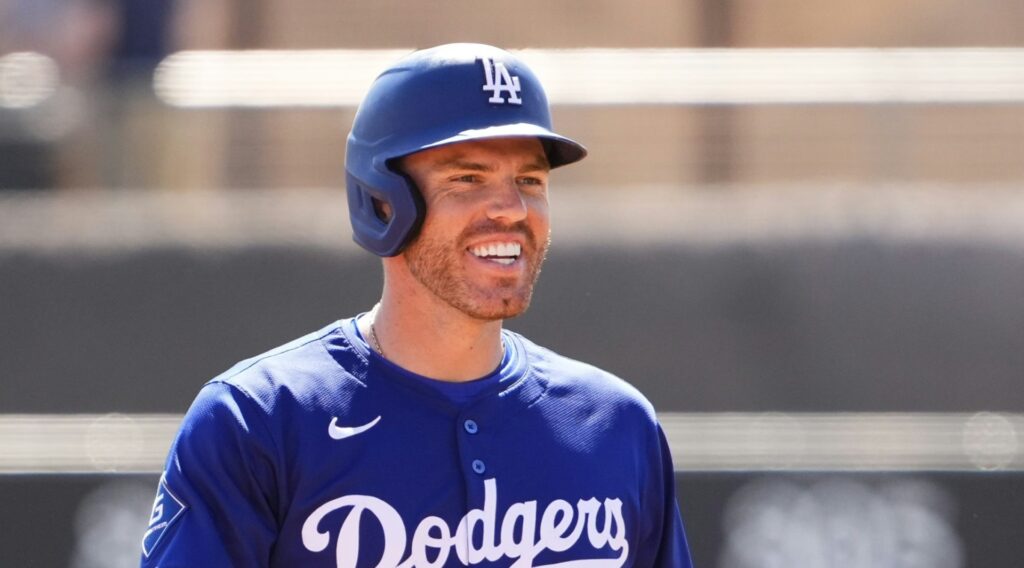 Los Angeles Dodgers Freddie Freeman smiles after hitting a 2-RBI double off Arizona Diamondbacks pitcher John Curtiss in the first inning during a spring training game at Camelback Ranch-Glendale in Phoenix on March 10, 2025.