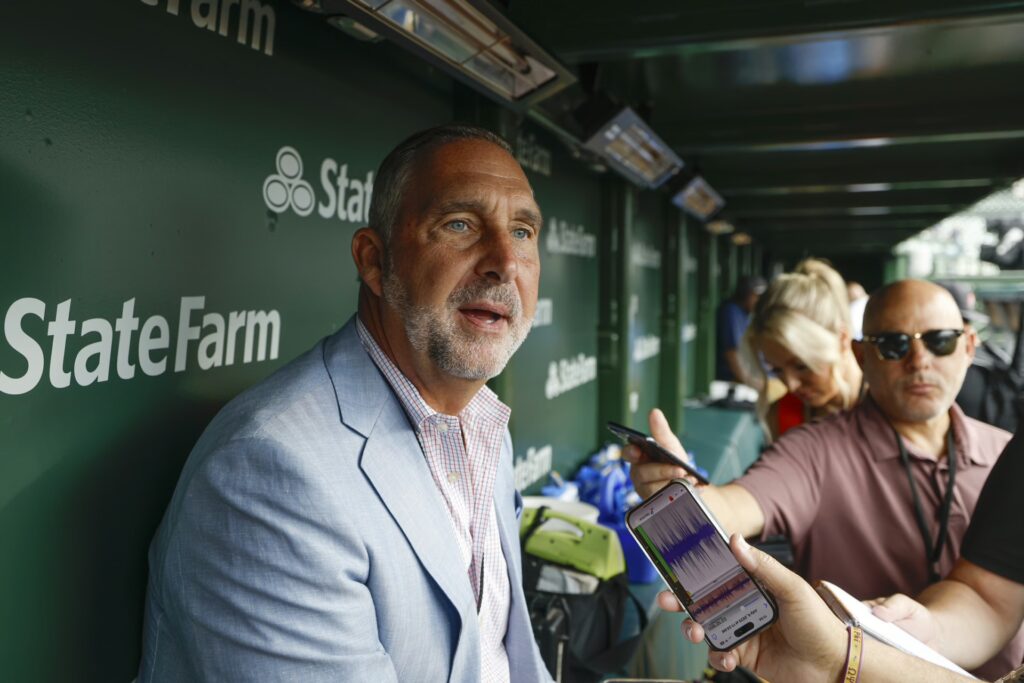 St. Louis Cardinals president of baseball operations John Mozeliak speaks before a baseball game against the Chicago Cubs at Wrigley Field.