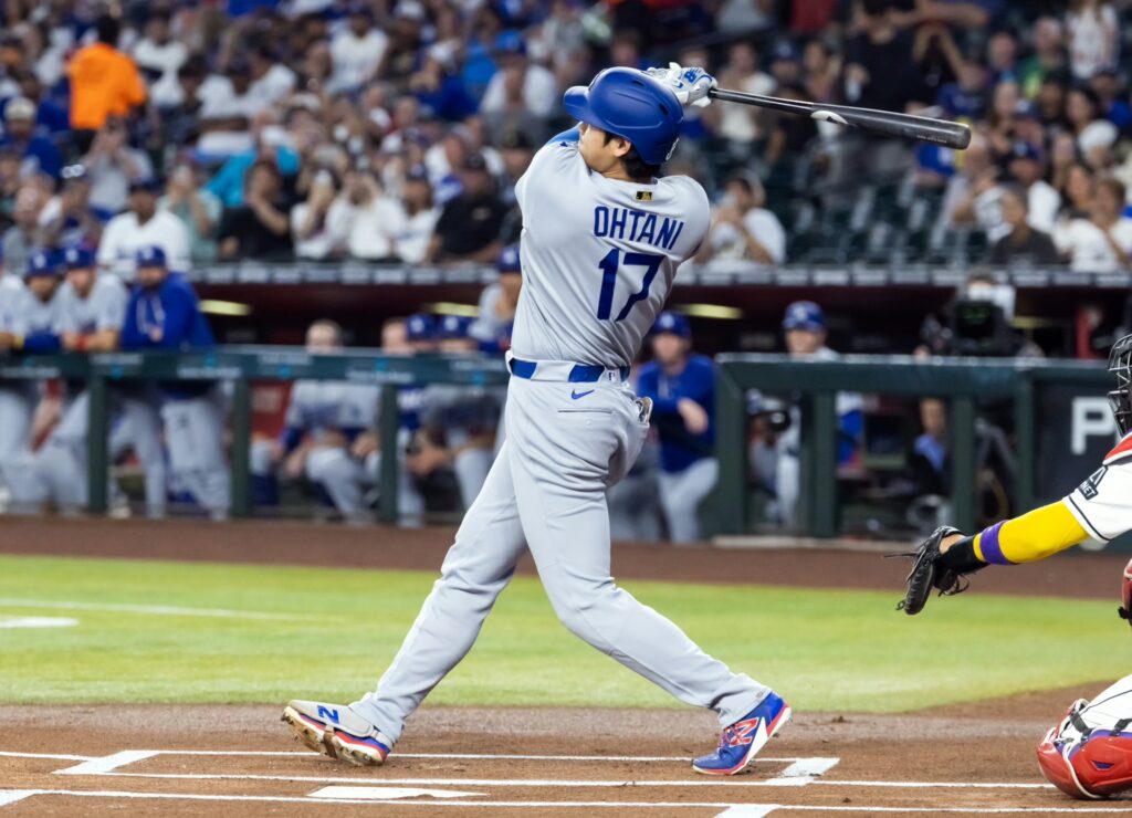 Jun 2, 2026; Phoenix, Arizona, USA; Los Angeles Dodgers designated hitter Shohei Ohtani hits a double in the first inning against the Arizona Diamondbacks at Chase Field. Mandatory Credit: Mark J. Rebilas-Imagn Images