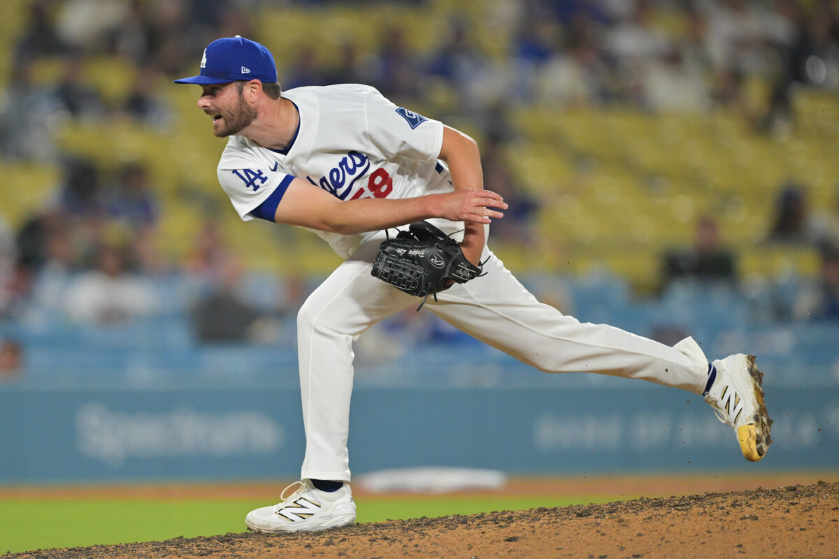May 11, 2026; Los Angeles, California, USA; Los Angeles Dodgers relief pitcher Wyatt Mills (58) delivers a pitch in the ninth inning against the San Francisco Giants at Dodger Stadium. Mandatory Credit: Jayne Kamin-Oncea-Imagn Images