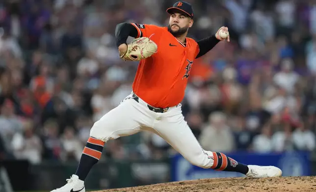 Detroit Tigers pitcher Enmanuel de Jesus throws against the Houston Astros during the ninth inning of a baseball game Friday, June 26, 2026, in Detroit. (AP Photo/Paul Sancya)