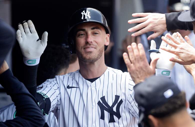 New York Yankees left fielder Cody Bellinger celebrates in the dugout after slugging a two-run home run against the Kansas City Royals at Yankee Stadium.