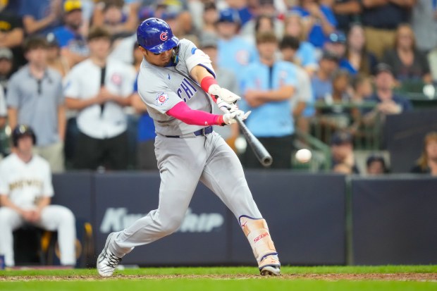 Chicago Cubs designated hitter Seiya Suzuki hits a two-RBI single during the 10th inning of a baseball game against the Milwaukee Brewers, Sunday, June 28, 2026, in Milwaukee. (AP Photo/Kayla Wolf)