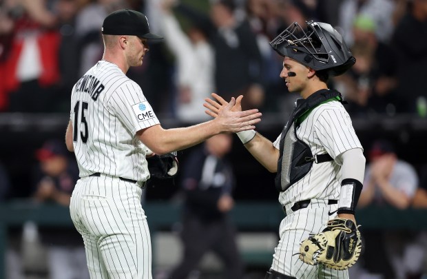 White Sox reliever Sean Newcomb and catcher Drew Romo celebrate after securing a victory over the Guardians in the ninth inning Tuesday, June 23, 2026, at Rate Field. (Chris Sweda/Chicago Tribune)