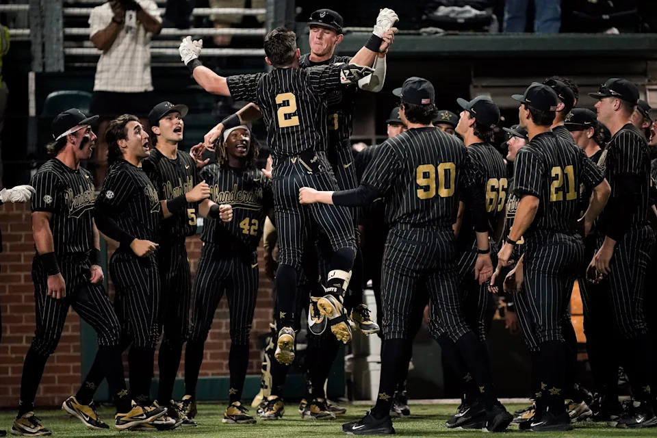 Vanderbilt right fielder Logan Johnstone (2) celebrates his home run against Oklahoma with infielder Carter Johnstone (3) during the eighth inning at Hawkins Field in Nashville, Tenn., Thursday, April 9, 2026.