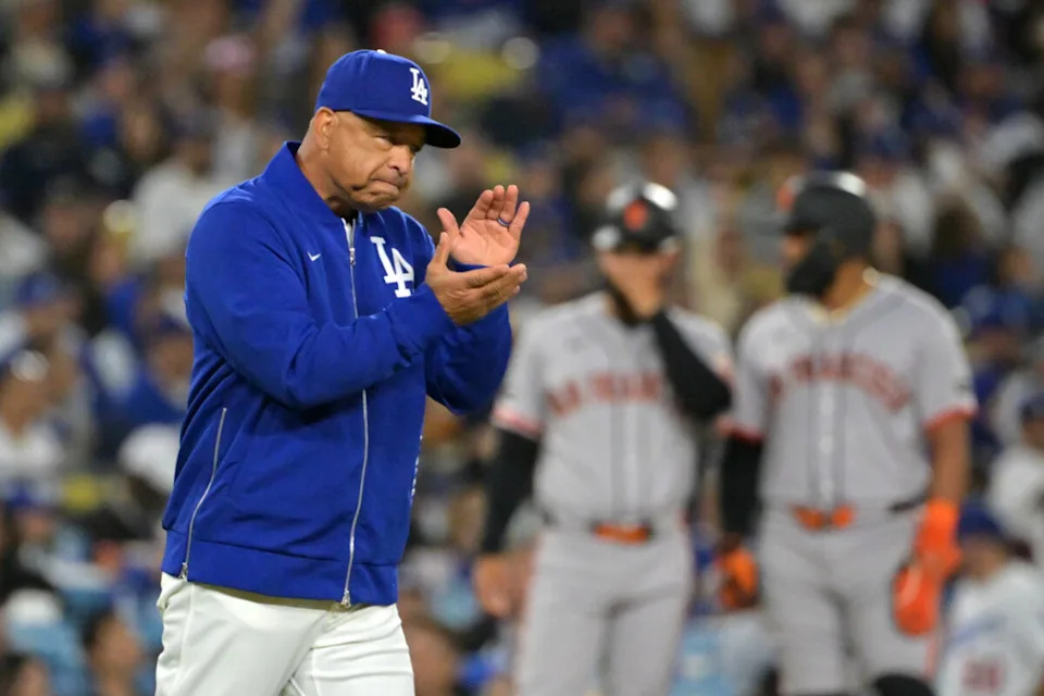 May 12, 2026; Los Angeles, California, USA; Los Angeles Dodgers manager Dave Roberts (30) reacts as he walks to the mound for a pitching change against the San Francisco Giants during the seventh inning at Dodger Stadium. Mandatory Credit: Jayne Kamin-Oncea-Imagn Images