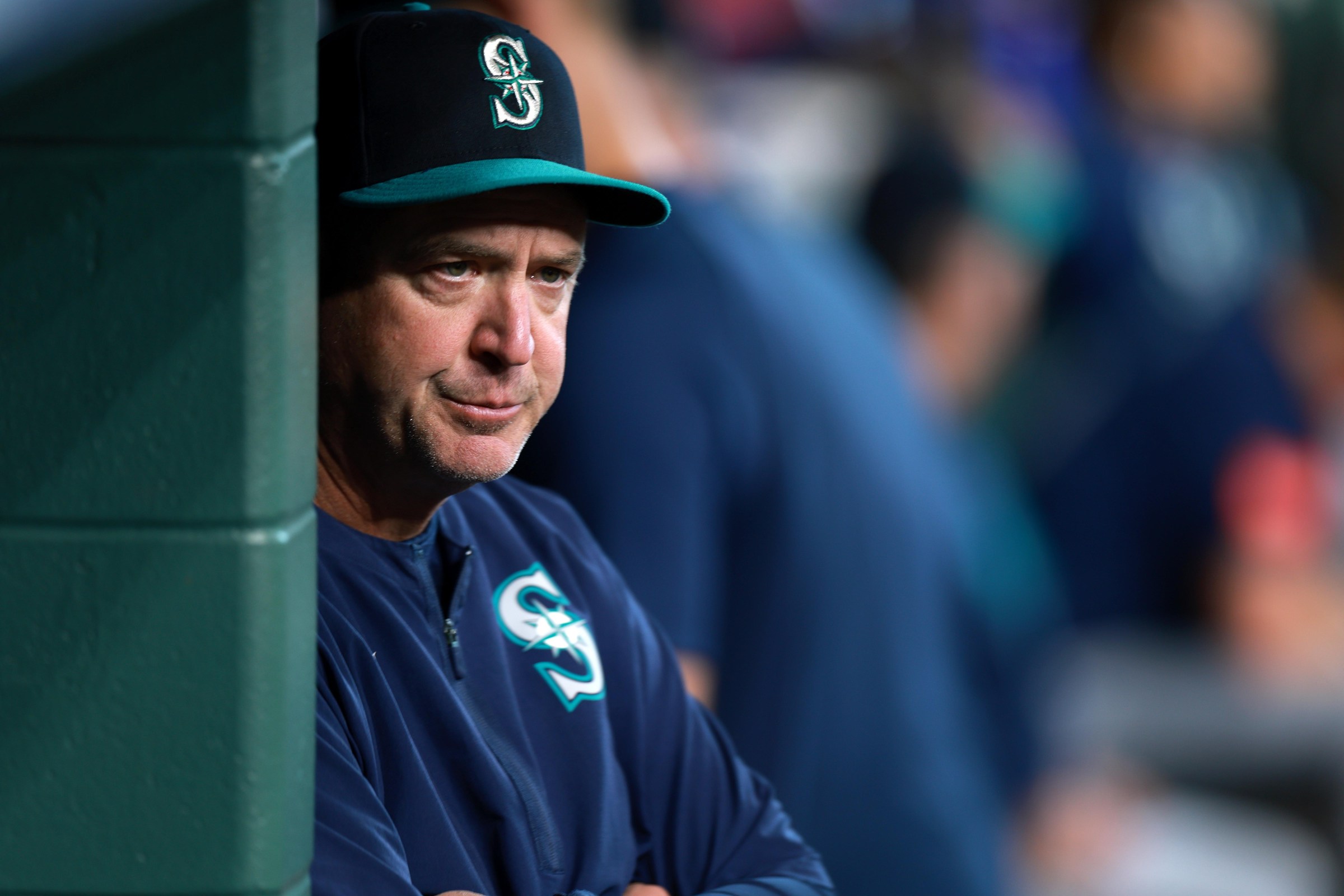 HOUSTON, TEXAS - MAY 13: Manager Dan Wilson of the Seattle Mariners looks on from the dugout during the first inning against the Houston Astros at Daikin Park on May 13, 2026 in Houston, Texas. (Photo by Kenneth Richmond/Getty Images)