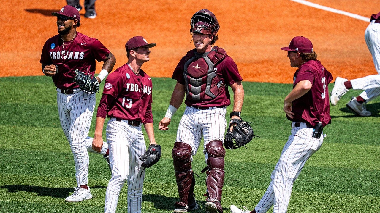 Little Rock baseball team celebrates with bus driver on the field after upset win to advance to Super Regional