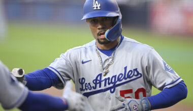 Jun 26, 2026; San Diego, California, USA; Los Angeles Dodgers shortstop Mookie Betts (50) is congratulated after hitting a solo home run during the second inning against the San Diego Padres at Petco Park. Mandatory Credit: Denis Poroy-Imagn Images