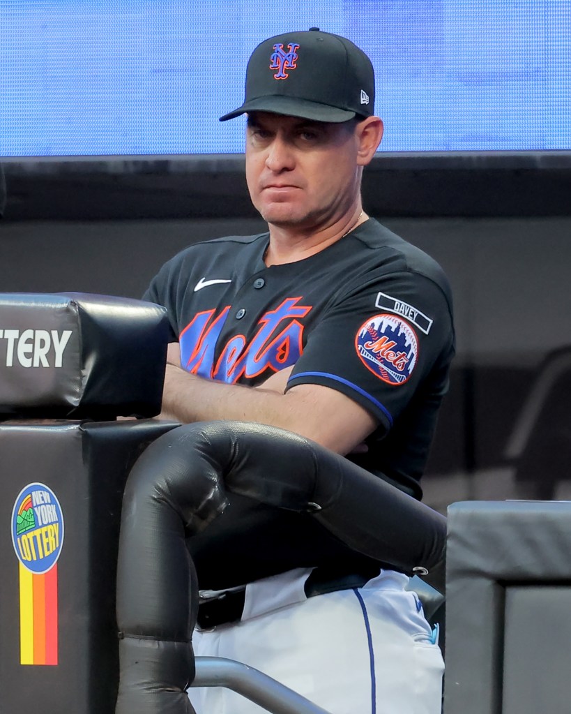 New York Mets manager Carlos Mendoza in the dugout.