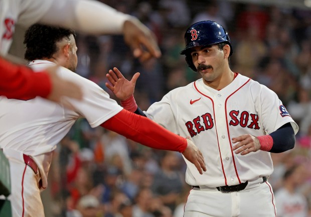 Boston Red Sox catcher Mickey Gasper celebrates scoring during the fifth inning at Fenway Park. (Photo By Matt Stone/Boston Herald)