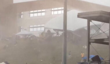 Strong wind at NCAA baseball tournament in West Virginia sends 5 people to the hospital