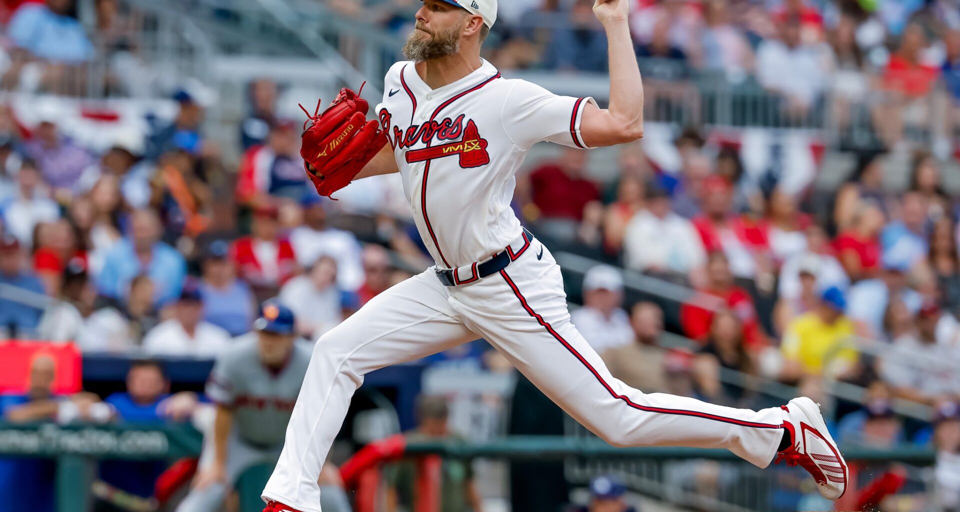 Braves unleash 5 homers in a 14-3 rout of the Mets as Chris Sale earns win