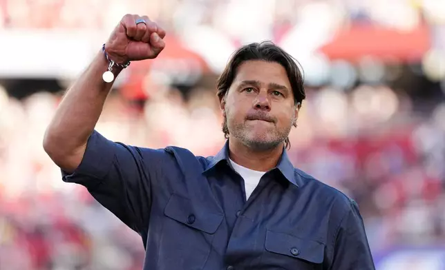 United States head coach Mauricio Pochettino gestures as he walks off the pitch after United States defeated Bosnia in the World Cup round of 32 soccer match between the United States and Bosnia in Santa Clara, Calif., near San Francisco, Wednesday, July 1, 2026. (AP Photo/Martin Meissner)
