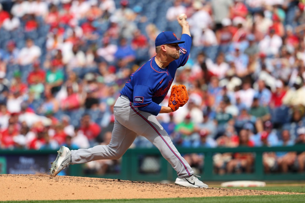 A.J. Minter #33 of the New York Mets throws a pitch in the seventh inning during a game against the Philadelphia Phillies at Citizens Bank Park on July 19, 2026 in Philadelphia, Pennsylvania.