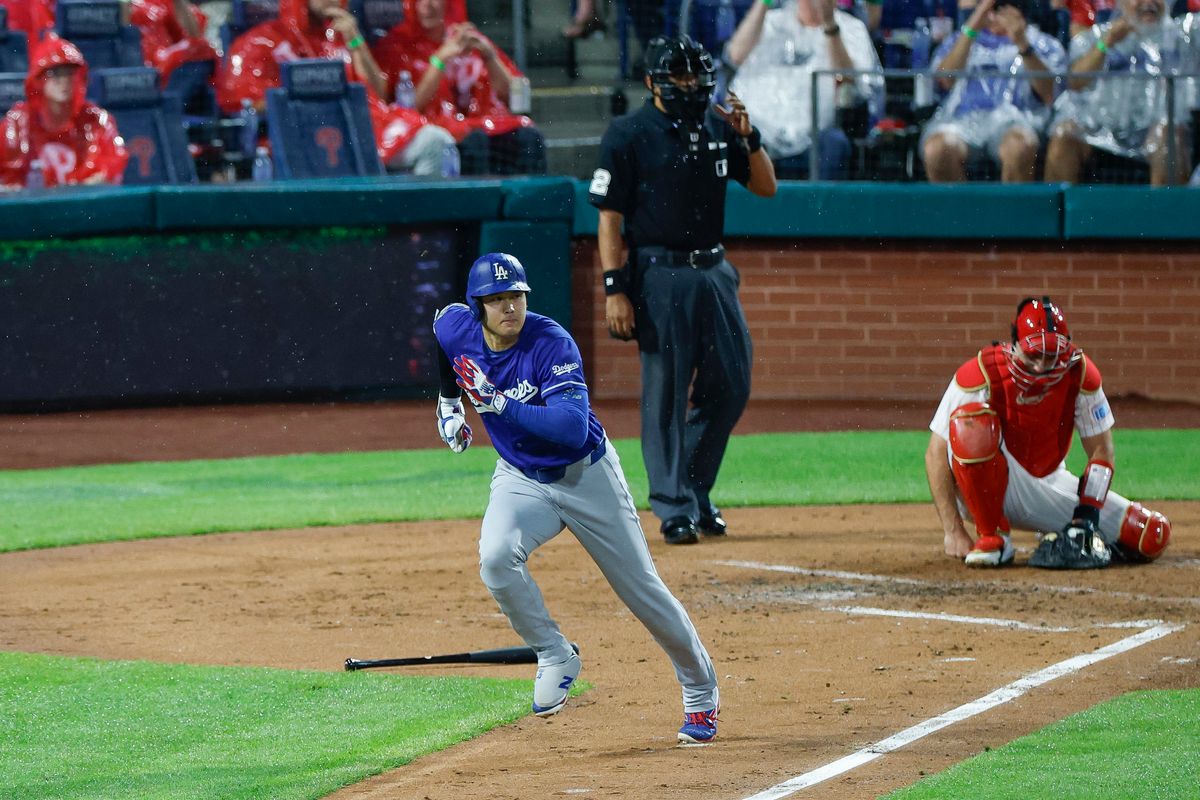 Shohei Ohtani #17 of the Los Angeles Dodgers runs up the line on a single against the Philadelphia Phillies at Citizens Bank Park on July 21, 2026 in Philadelphia, Pennsylvania.