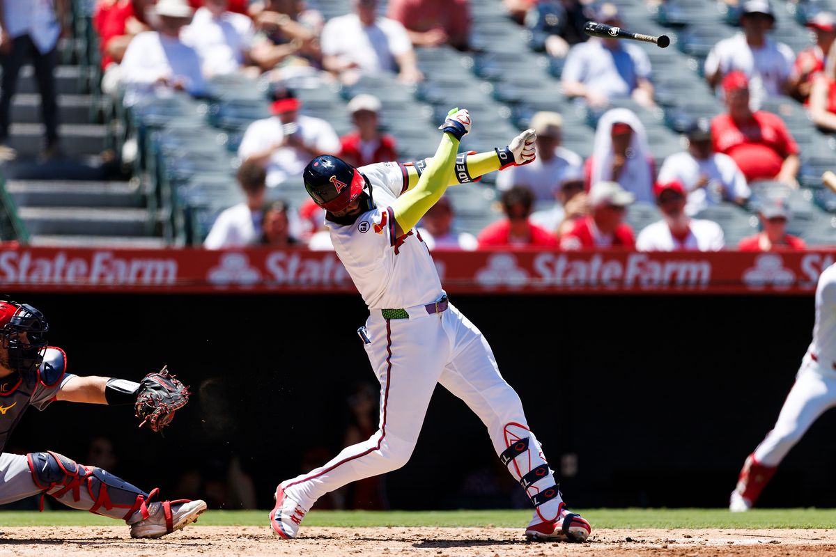 Jo Adell #7 of the Los Angeles Angels loses his bat during the game against the St. Louis Cardinals at Angel Stadium of Anaheim on July 22, 2026 in Anaheim, California. 