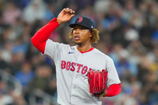 Boston Red Sox pitcher Brayan Bello reacts after loading the bases in the third inning of a baseball game against Toronto Blue Jays in Toronto earlier this season. (Chris Young/The Canadian Press via AP)