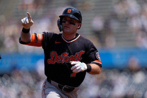 Detroit Tigers' Kevin McGonigle (7) gestures to fans as he runs the bases after hitting a home run during the third inning of a baseball game against the New York Yankees Wednesday, July 1, 2026, in New York. (AP Photo/Frank Franklin II)