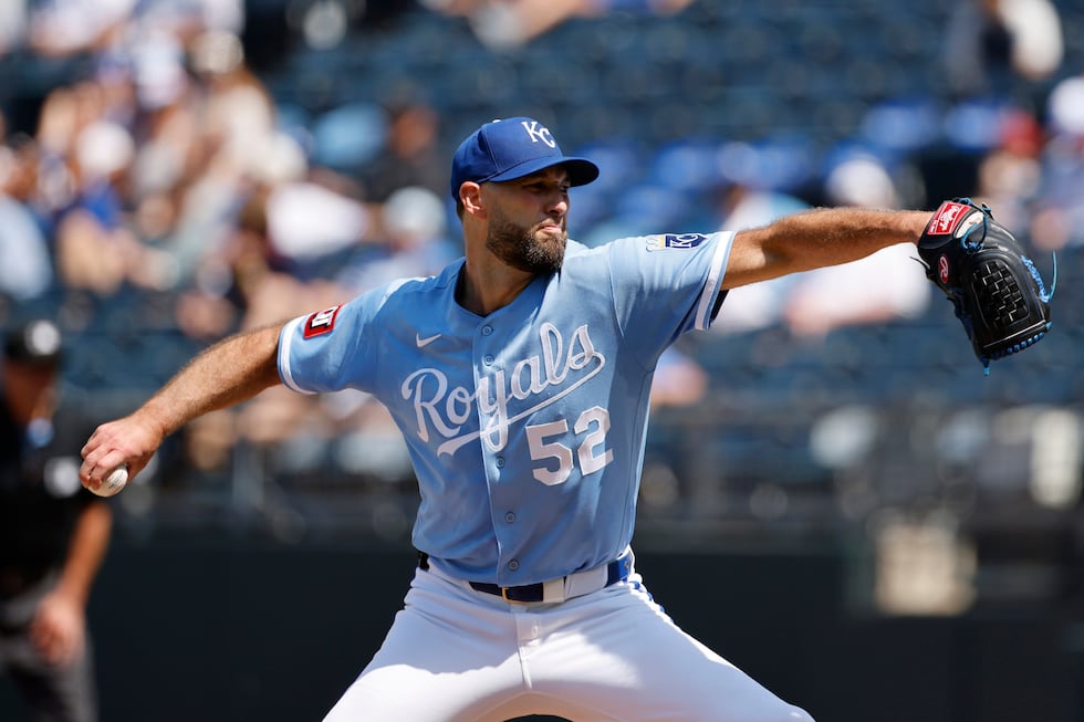 Kansas City Royals pitcher Michael Wacha delivers to a Texas Rangers batter during the first...