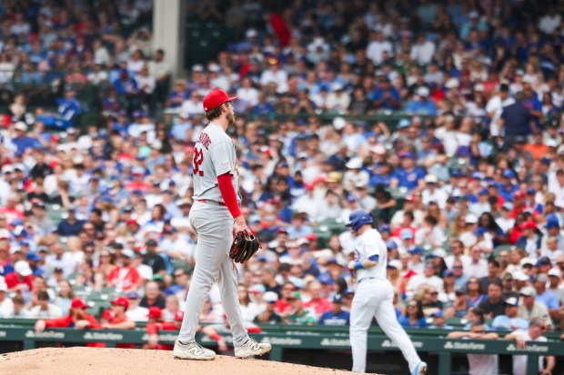 St. Louis Cardinals pitcher Matthew Liberatore (32) reacts after hitting Chicago Cubs left fielder Ian Happ (8) with a pitch during the first inning at Wrigley Field on Sunday, July 5, 2026. (Eileen T. Meslar/Chicago Tribune)