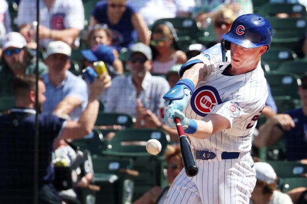 Cubs center fielder Pete Crow-Armstrong (4) hits a home run against the Padres in the fifth inning at Wrigley Field on July 1, 2026. (Terrence Antonio James/Chicago Tribune)