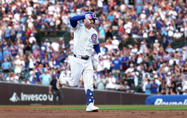 Cubs' Alex Bregman gives a thumbs-down sign as he rounds the bases after hitting a three-run home run in the second inning against the Padres at Wrigley Field on June 30, 2026. (Chris Sweda/Chicago Tribune)