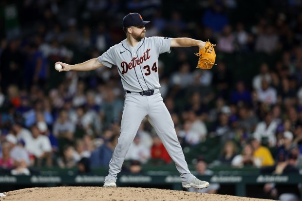 Tigers catcher Jake Rogers (34) pitches during the eighth inning against the Cubs at Wrigley Field July 21, 2026 in Chicago. (Armando L. Sanchez/Chicago Tribune)