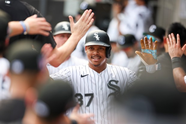 Chicago White Sox center fielder Junior Pérez celebrates in the dugout after hitting a two-run home run during the eighth inning against the Houston Astros at Rate Field on Sunday, July 26, 2026. (Eileen T. Meslar/Chicago Tribune)