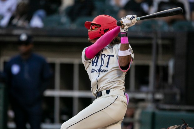 Homewood-Flossmoor's Mikey Watson (9) connects on a triple for the East All-Stars against the West during the Double Duty Classic at Rate Field in Chicago on Wednesday, July 22, 2026. (Vincent D. Johnson / Daily Southtown)