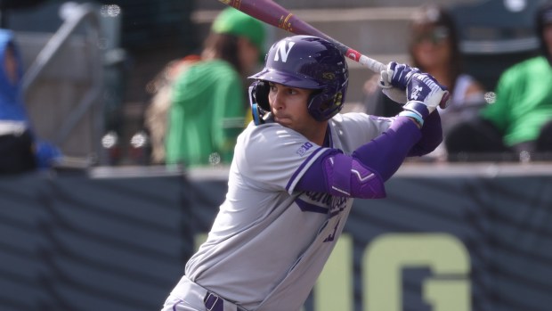Northwestern's Jack Lausch (13) looks to make contact against Oregon during the final game of a Big Ten series in Eugene, Oregon, on Sunday, March 22, 2026. (Amanda Loman / AP)